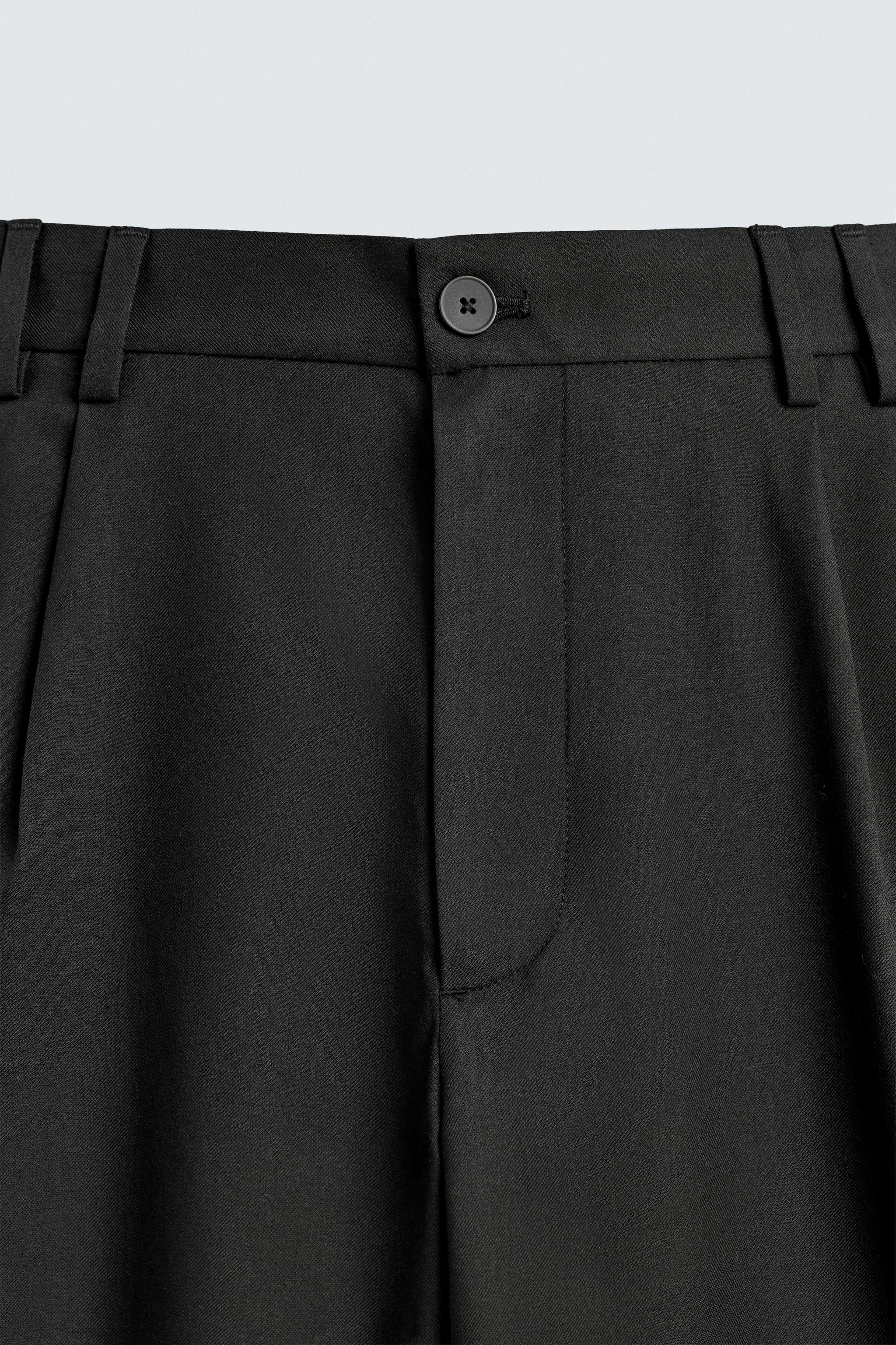RELAXED FIT PLEATED SUIT PANTS